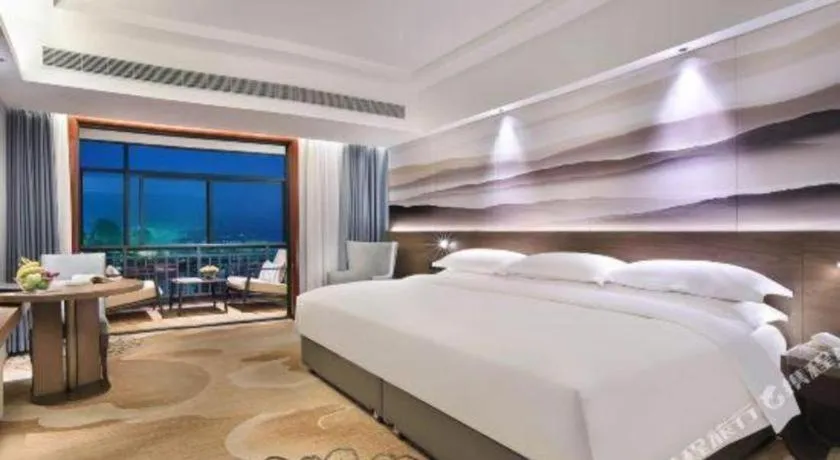 Bed in Vienna Hotel Guangxi Guilin 7-Star Wanda Plaza