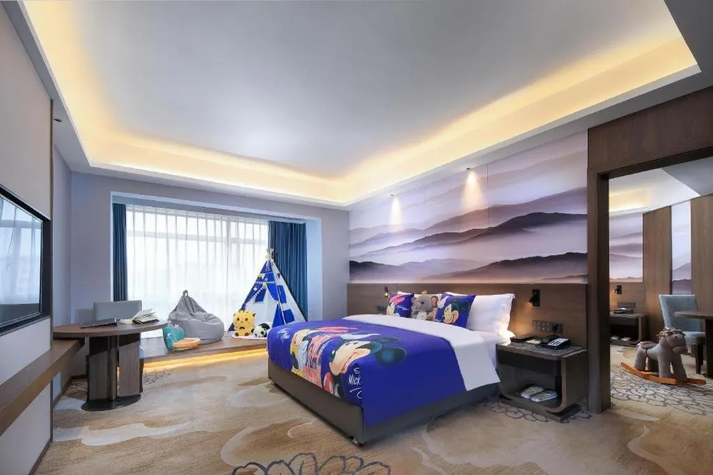 Bed in Vienna Hotel Guangxi Guilin 7-Star Wanda Plaza