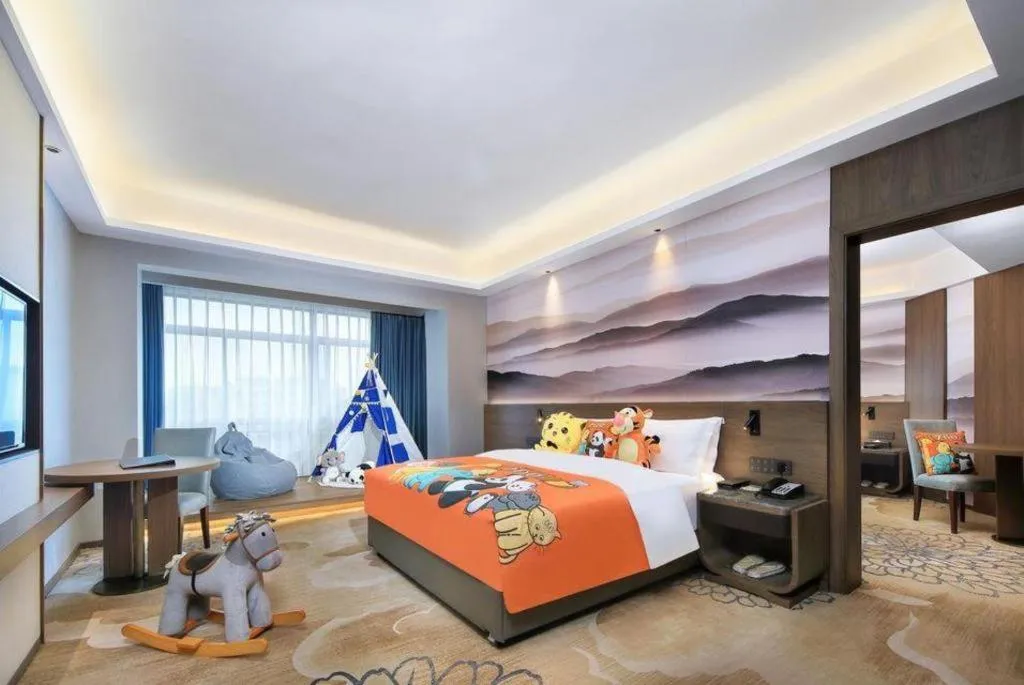 Bed in Vienna Hotel Guangxi Guilin 7-Star Wanda Plaza