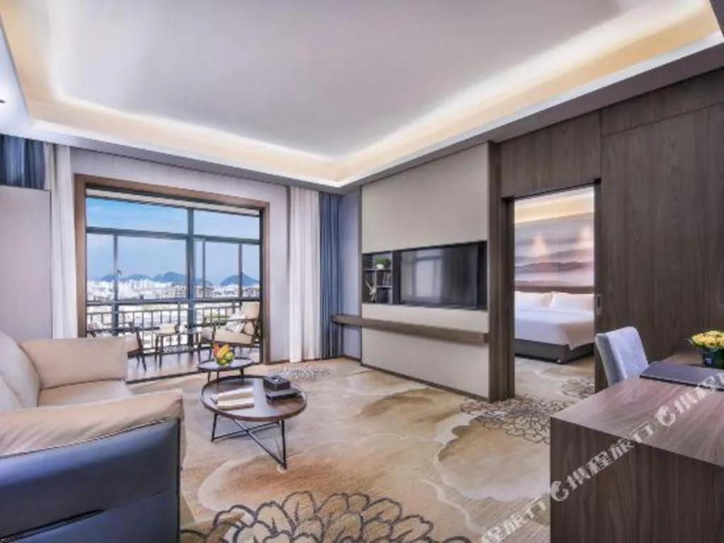 Bed in Vienna Hotel Guangxi Guilin 7-Star Wanda Plaza