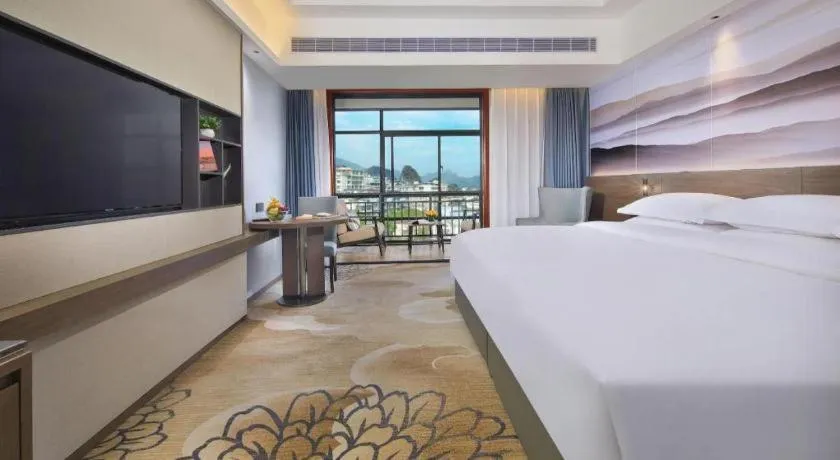 Bed in Vienna Hotel Guangxi Guilin 7-Star Wanda Plaza