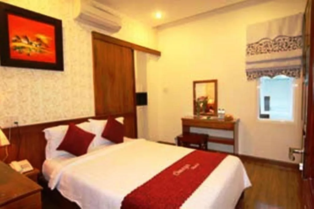 Bed in Omega Da Nang Beach Hotel