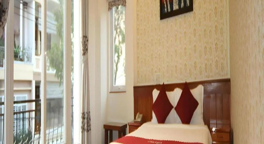 Bed in Omega Da Nang Beach Hotel