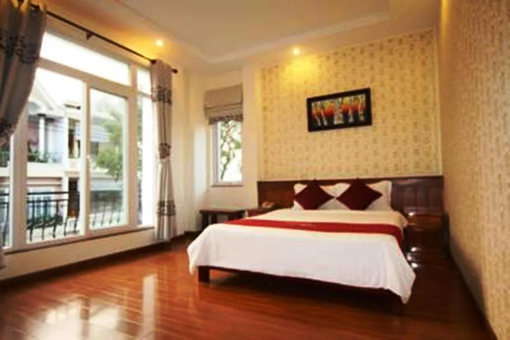 Bed in Omega Da Nang Beach Hotel