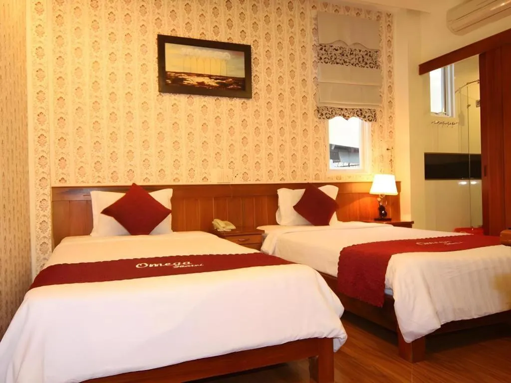 Bed in Omega Da Nang Beach Hotel