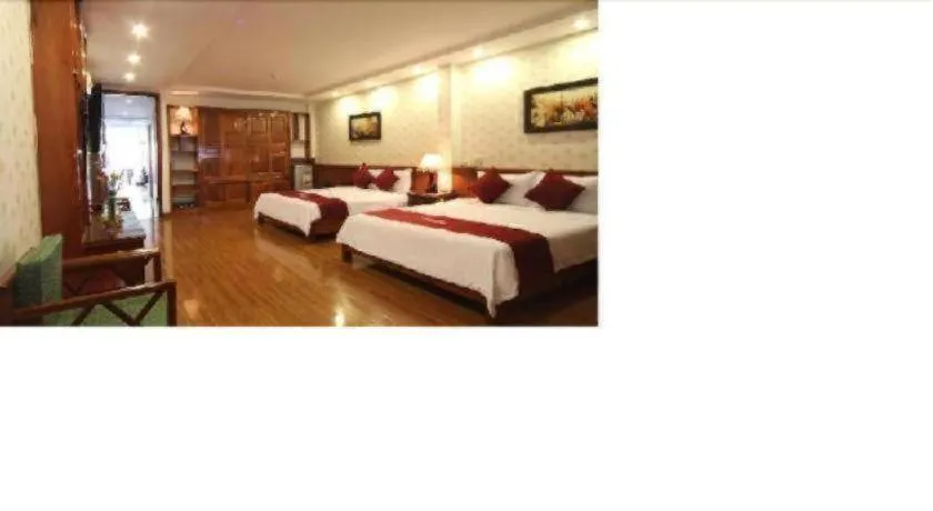 Bed in Omega Da Nang Beach Hotel