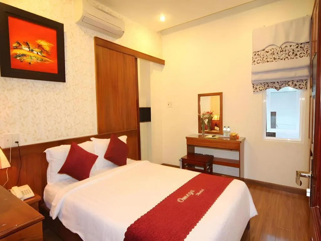 Bed in Omega Da Nang Beach Hotel