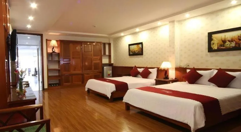Bed in Omega Da Nang Beach Hotel
