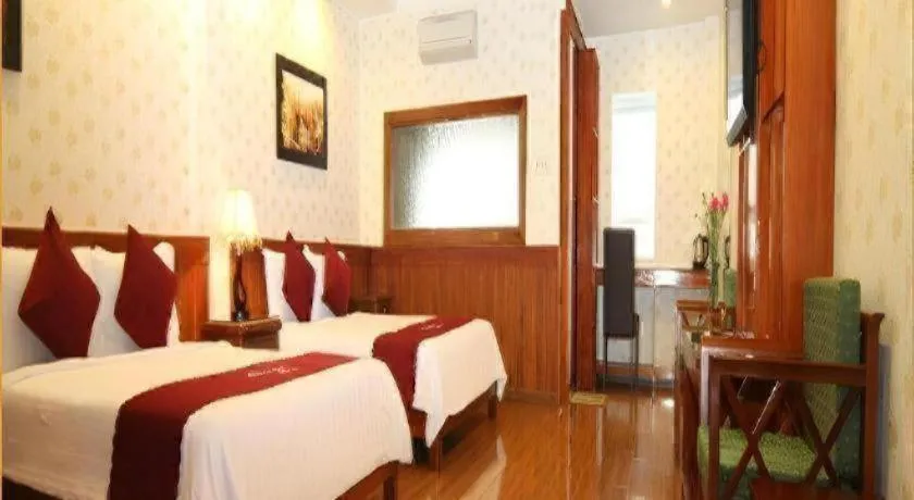 Bed in Omega Da Nang Beach Hotel