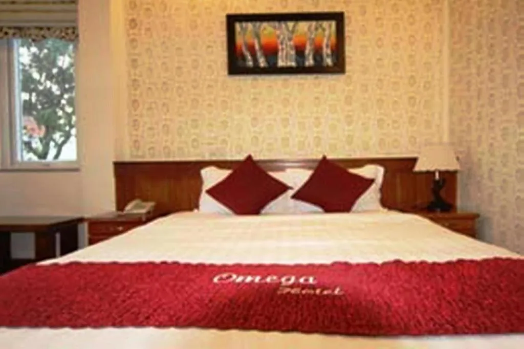 Bed in Omega Da Nang Beach Hotel