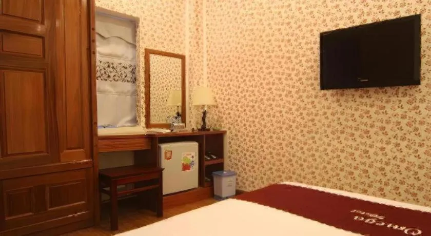 Bed in Omega Da Nang Beach Hotel