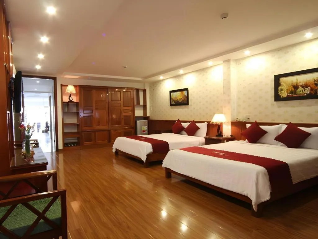 Bed in Omega Da Nang Beach Hotel