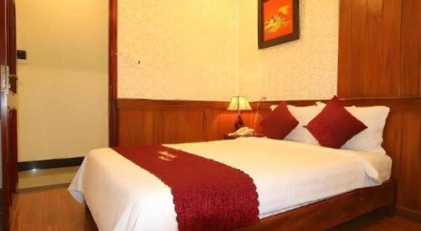 Bed in Omega Da Nang Beach Hotel