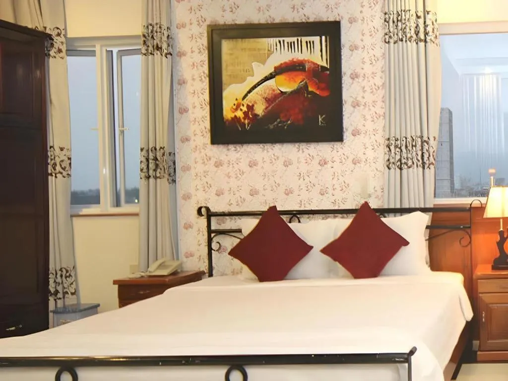 Bed in Omega Da Nang Beach Hotel