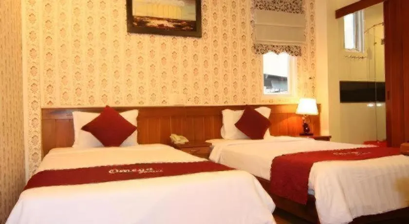 Bed in Omega Da Nang Beach Hotel