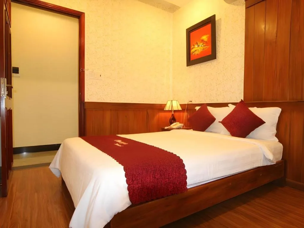 Bed in Omega Da Nang Beach Hotel