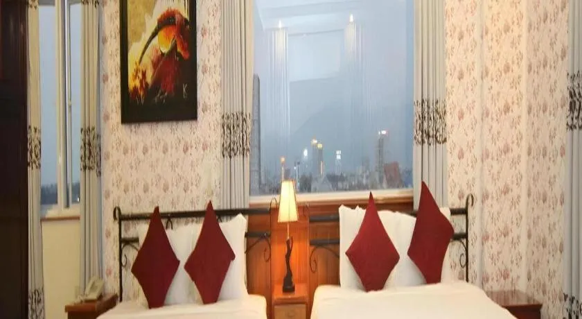 Bed in Omega Da Nang Beach Hotel