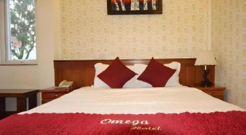 Bed in Omega Da Nang Beach Hotel