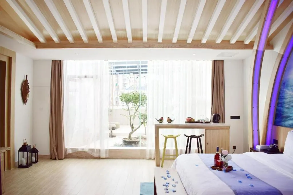 Bed in Huangma Holiday Nanhai Museum Hotel