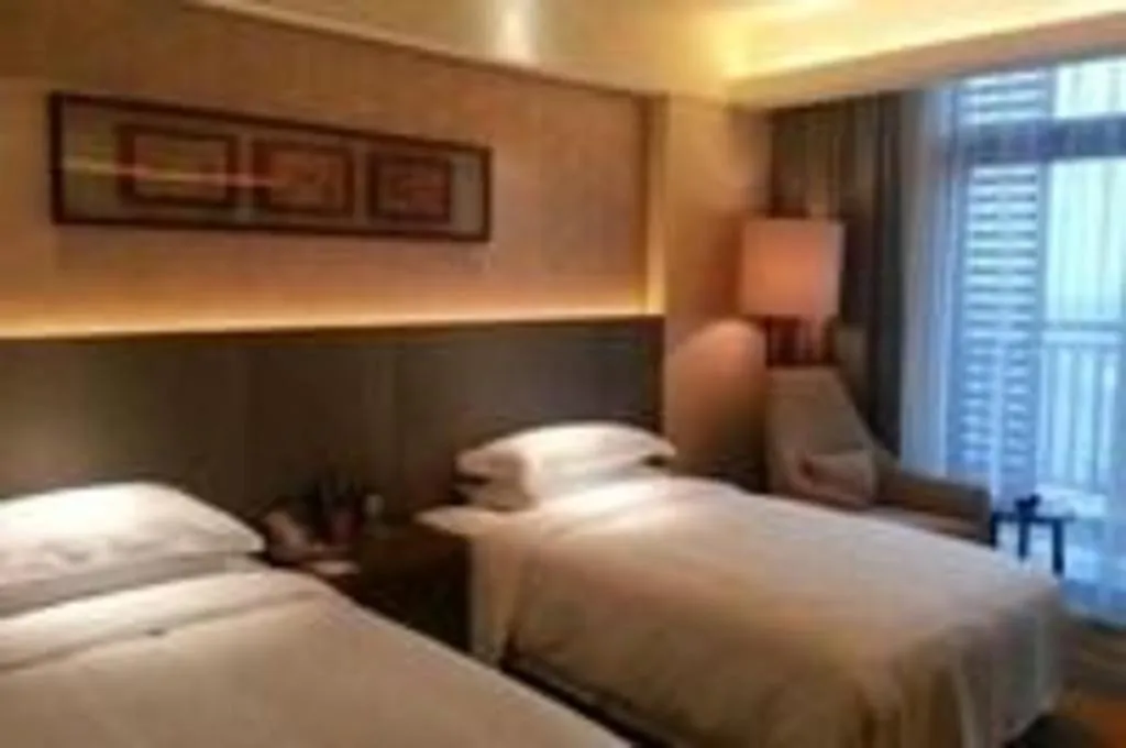 Bed in Wuhan Gleetour Hotel