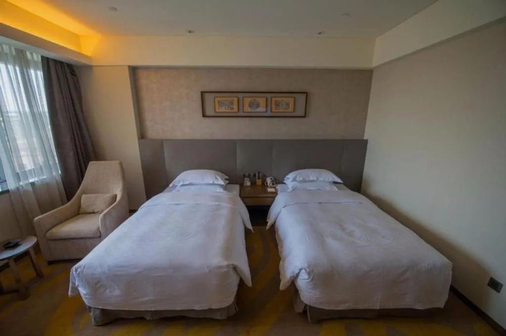 Bed in Wuhan Gleetour Hotel