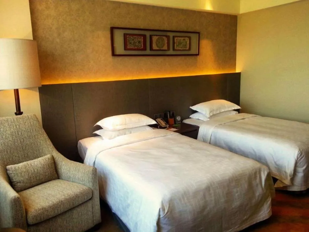 Bed in Wuhan Gleetour Hotel