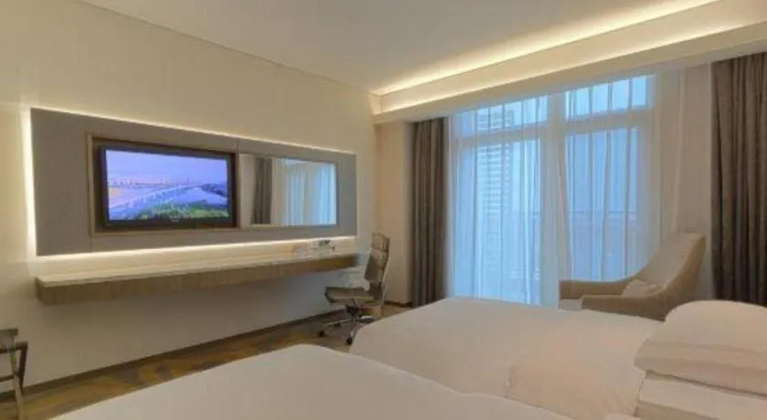 Bed in Wuhan Gleetour Hotel