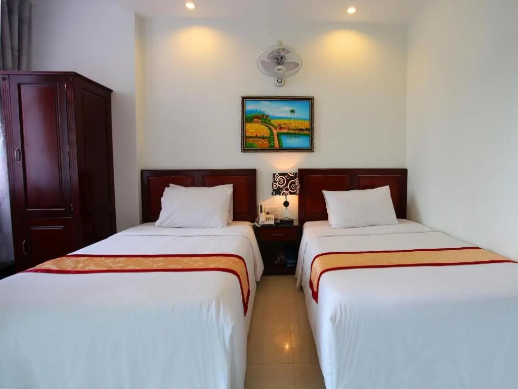 Bed in Souvenir Nha Trang Hotel