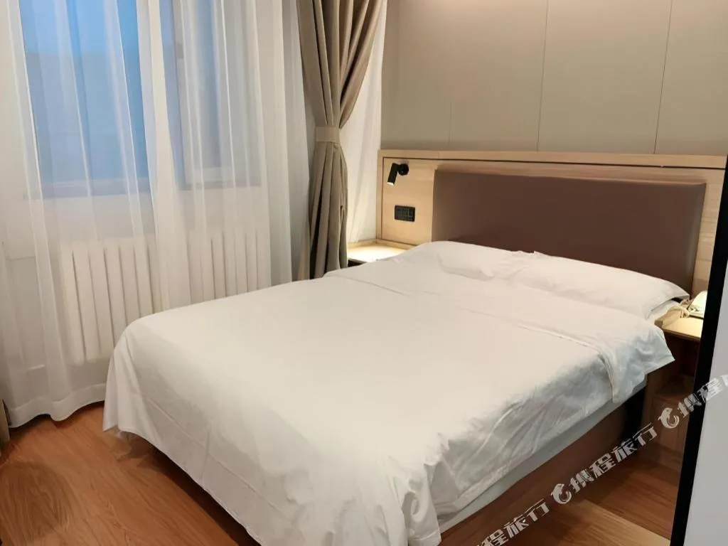 Bed in GreenTree Inn Beijing Fengtai Dongda Street Express Hotel
