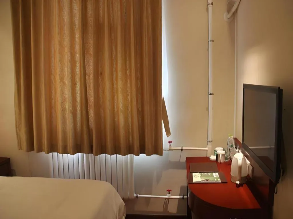 Bed in GreenTree Inn Beijing Fengtai Dongda Street Express Hotel