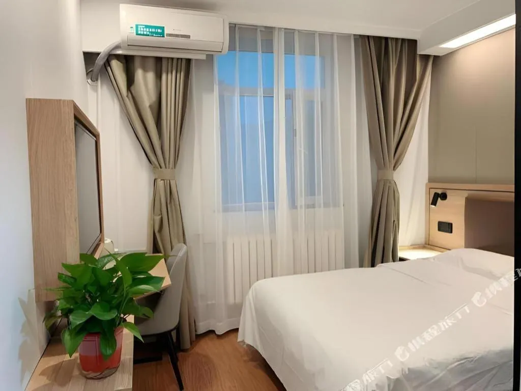 Bed in GreenTree Inn Beijing Fengtai Dongda Street Express Hotel