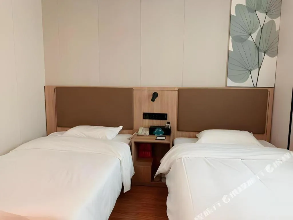 Bed in GreenTree Inn Beijing Fengtai Dongda Street Express Hotel