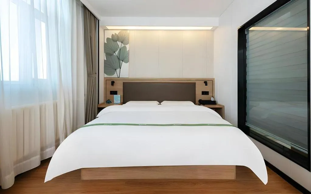Bed in GreenTree Inn Beijing Fengtai Dongda Street Express Hotel