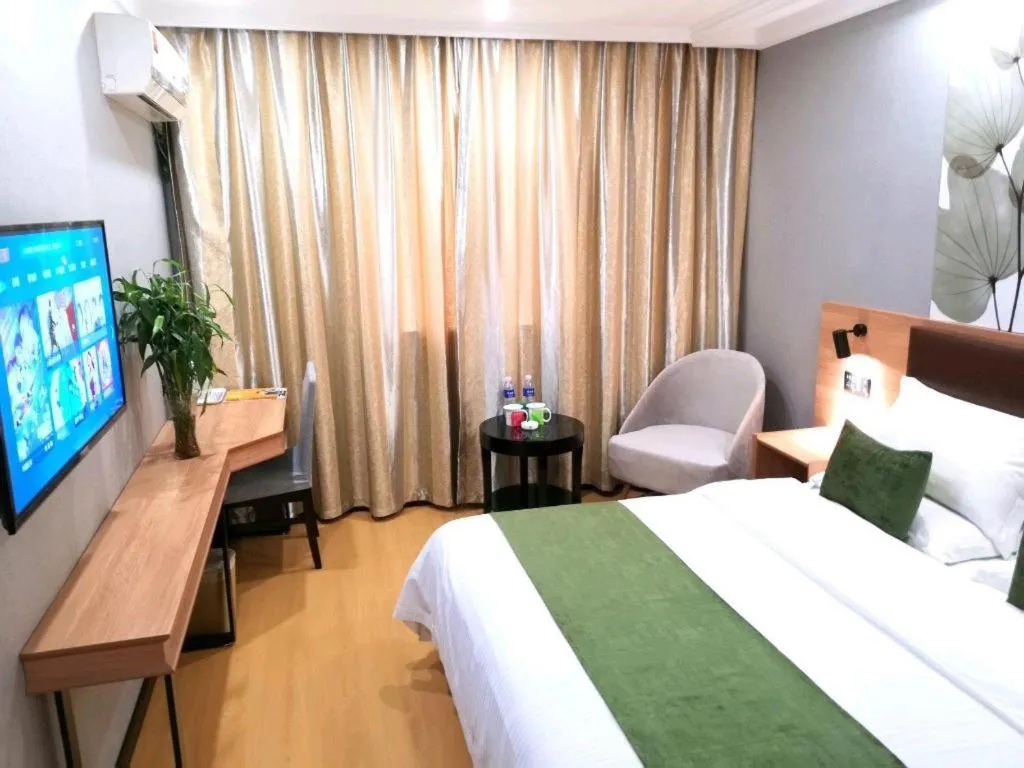 Bed in GreenTree Inn Yixing Zhangzhu Express Hotel