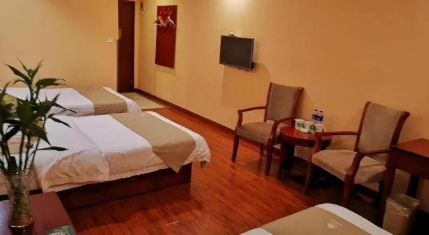 Bed in GreenTree Inn Yixing Zhangzhu Express Hotel