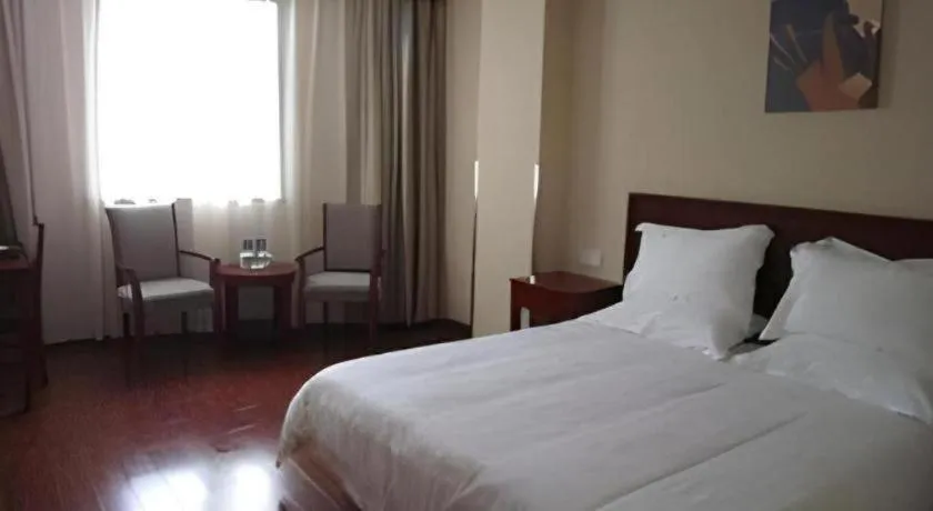 Bed in GreenTree Inn Yixing Zhangzhu Express Hotel