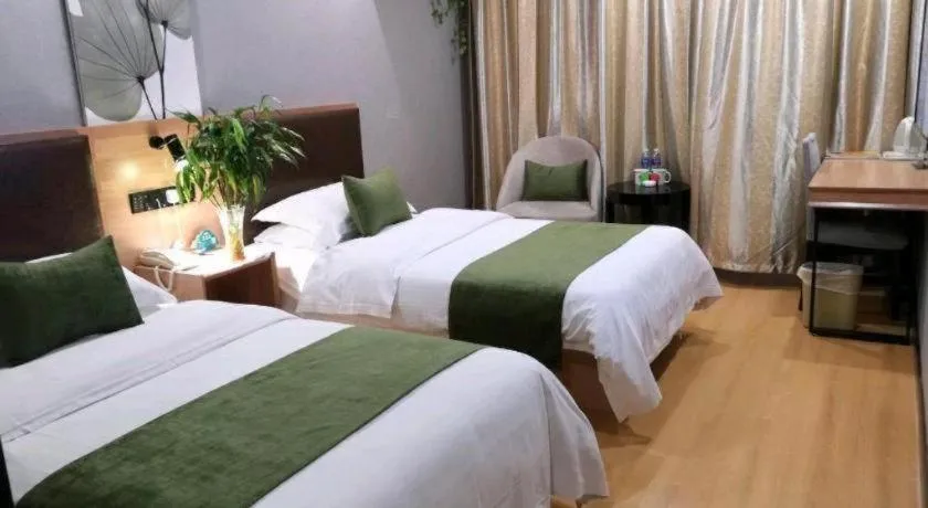 Bed in GreenTree Inn Yixing Zhangzhu Express Hotel