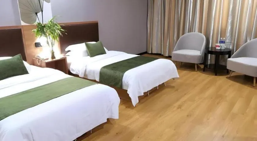 Bed in GreenTree Inn Yixing Zhangzhu Express Hotel