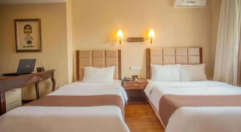 Bed in Anshan Camilla Business Hotel