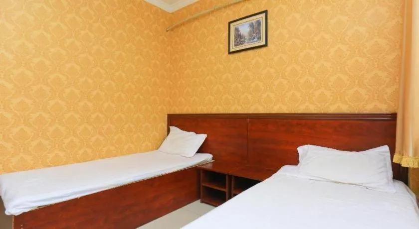 Bed in Anshan Camilla Business Hotel