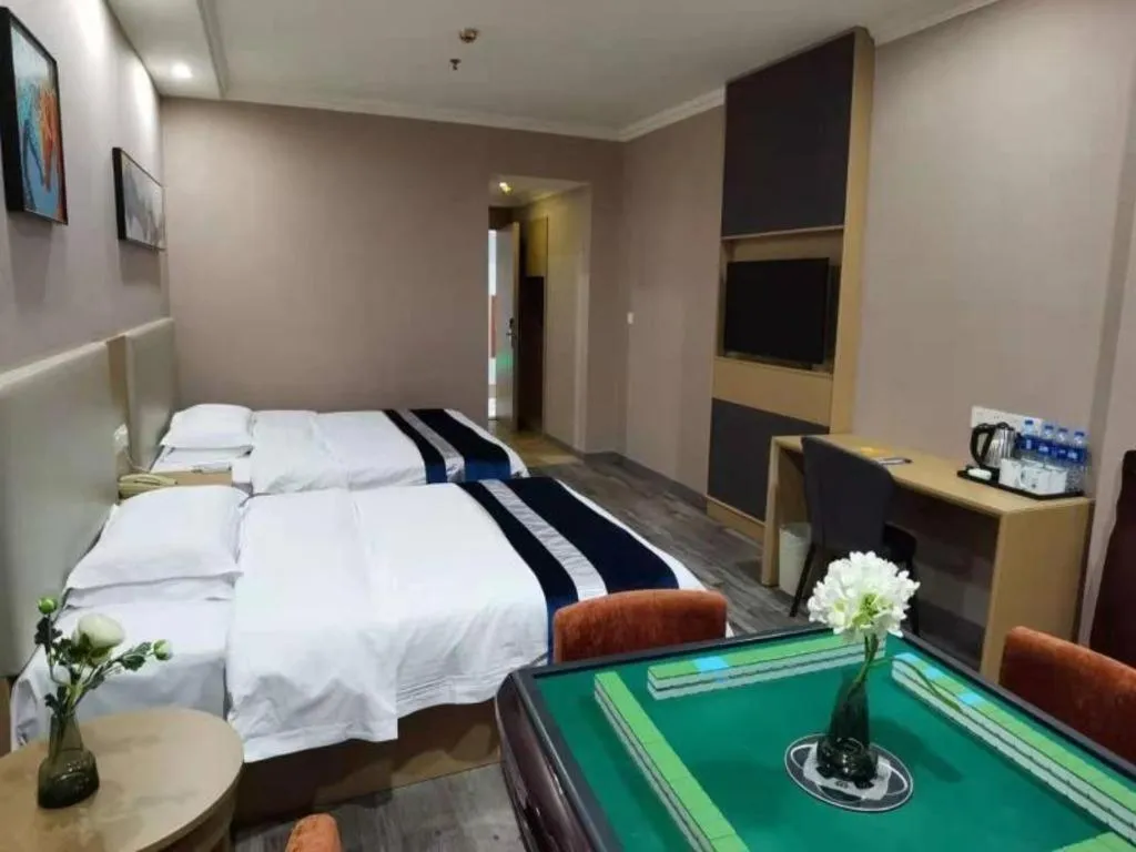 Bed in GreenTree Inn Nantong Haian Kaifa District Express Hotel