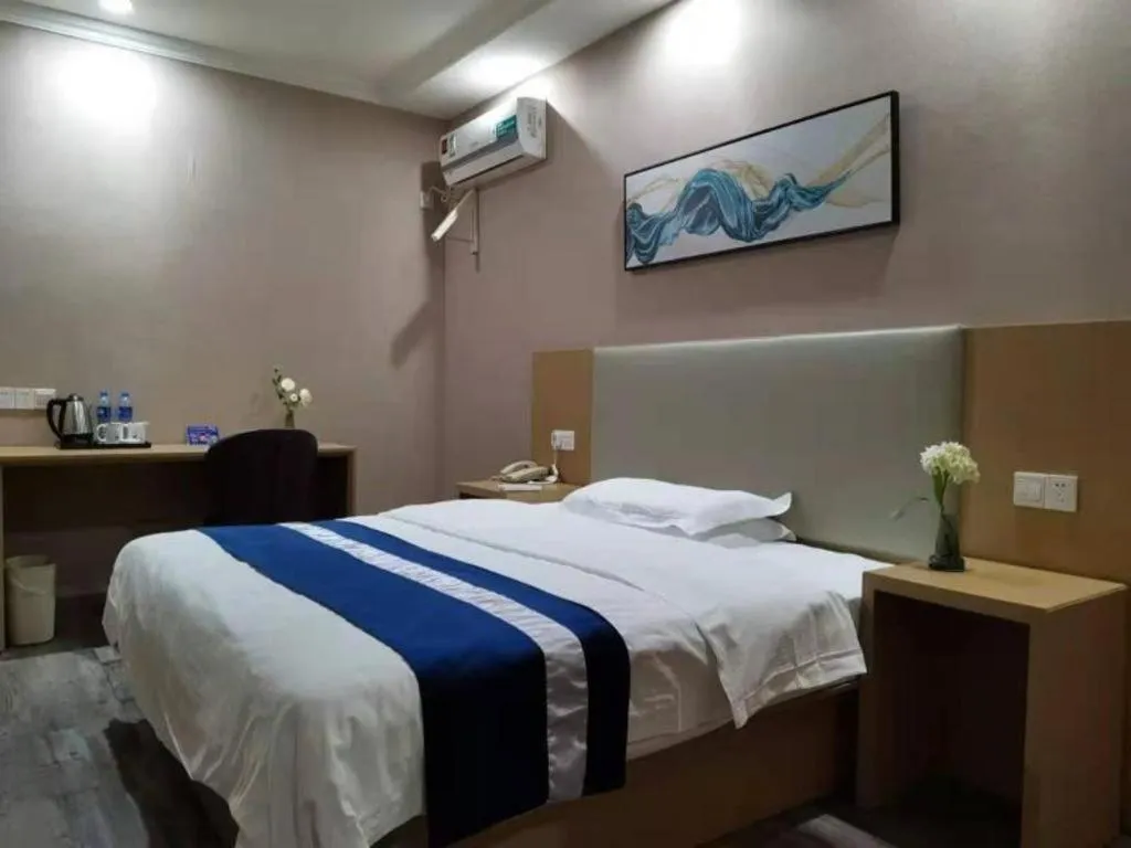 Bed in GreenTree Inn Nantong Haian Kaifa District Express Hotel