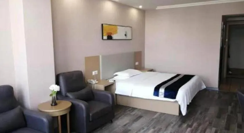 Bed in GreenTree Inn Nantong Haian Kaifa District Express Hotel