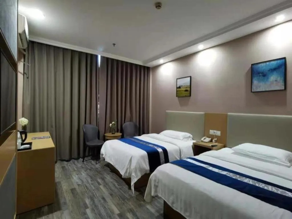 Bed in GreenTree Inn Nantong Haian Kaifa District Express Hotel