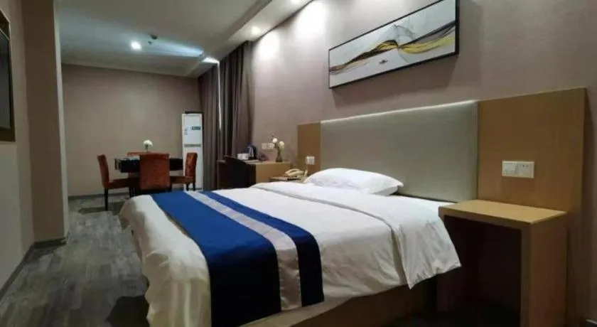 Bed in GreenTree Inn Nantong Haian Kaifa District Express Hotel