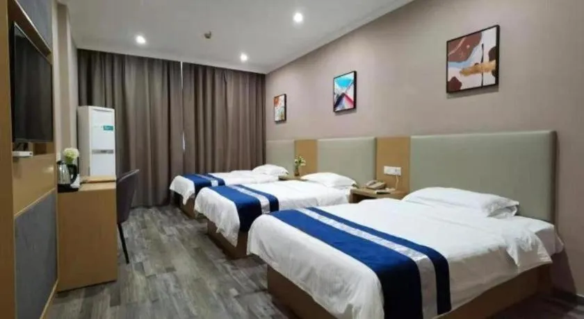 Bed in GreenTree Inn Nantong Haian Kaifa District Express Hotel