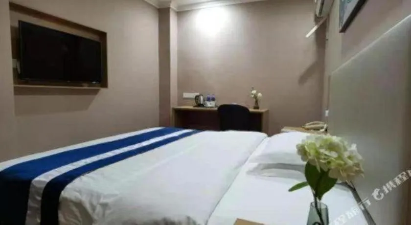 Bed in GreenTree Inn Nantong Haian Kaifa District Express Hotel