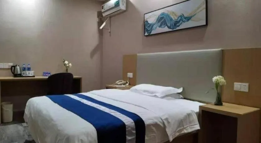 Bed in GreenTree Inn Nantong Haian Kaifa District Express Hotel