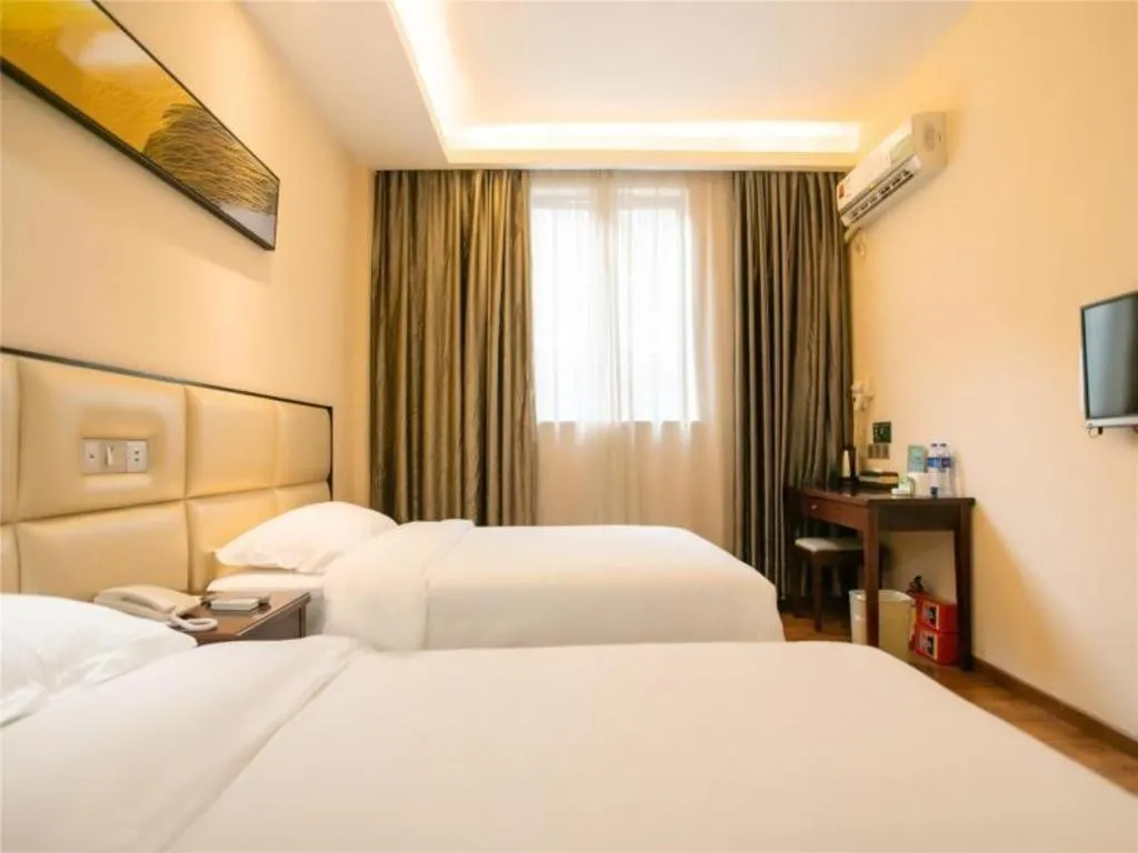 Bed in GreenTree Inn Guangzhou Panyu Bus Station Business Hotel