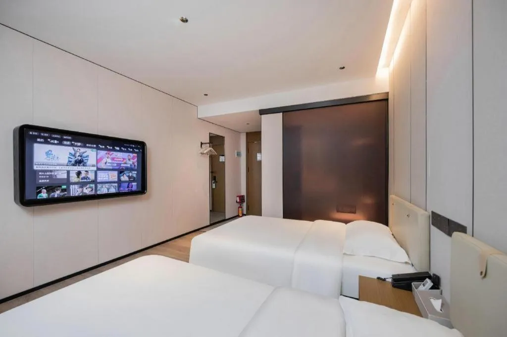 Bed in GreenTree Inn Guangzhou Panyu Bus Station Business Hotel